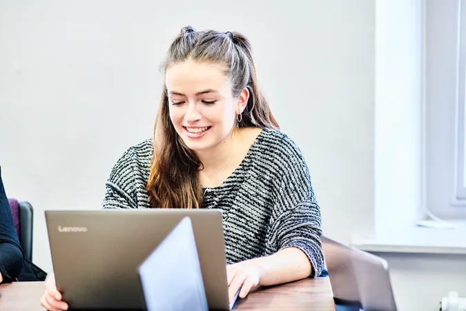 A student working on a laptop
