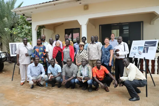 A photograph of a group of participants at a workshop in South Sudan,