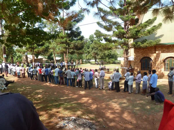 A photograph of voters queuing in Uganda, 2016.