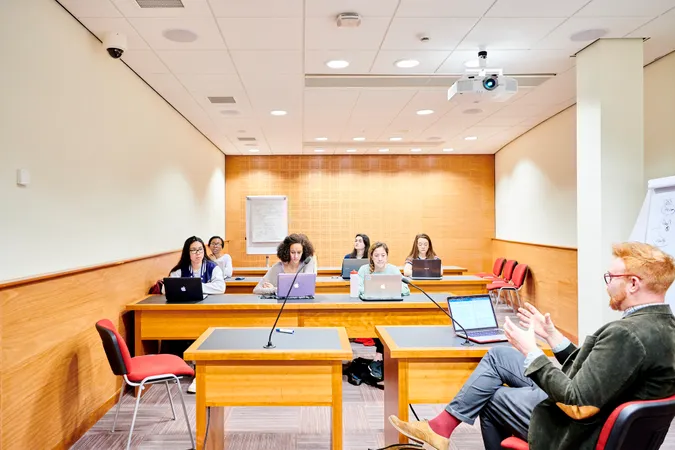 Lecturer and students in classroom