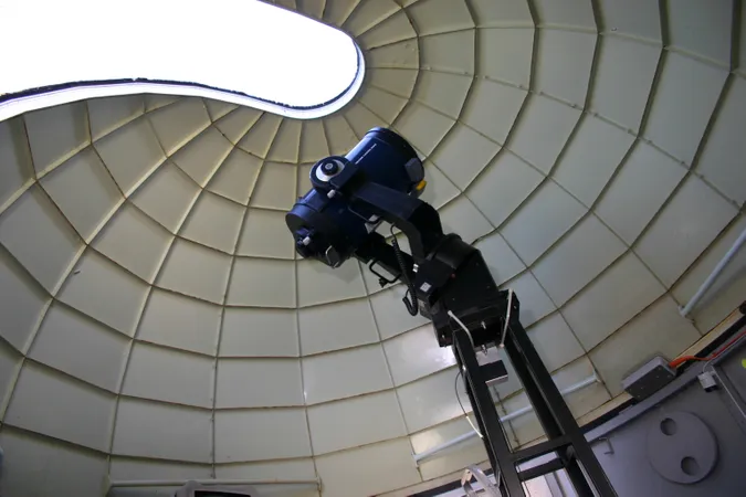 The dome begins to open above one of the department telescopes