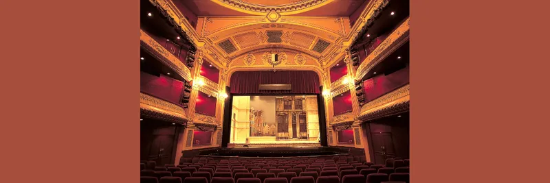 The inside of a theatre with a stage set for an opera performance