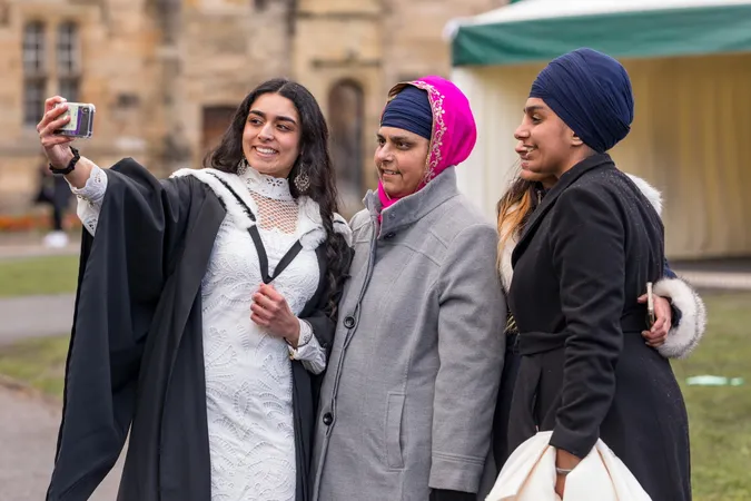 Graduate and family taking a selfie at Congregation