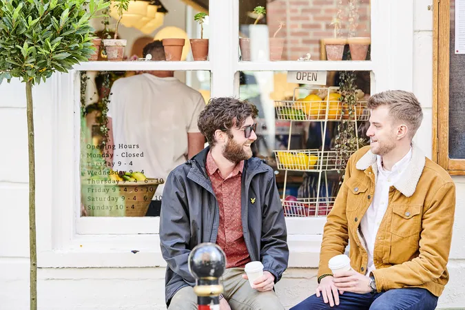Students sitting outside a cafe