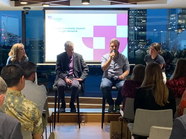 A panel discussing alumni topics