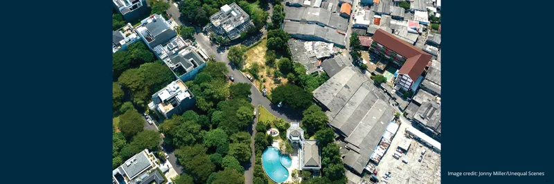 Leafy, residential area with large houses backing onto an area of compact, more deprived housing