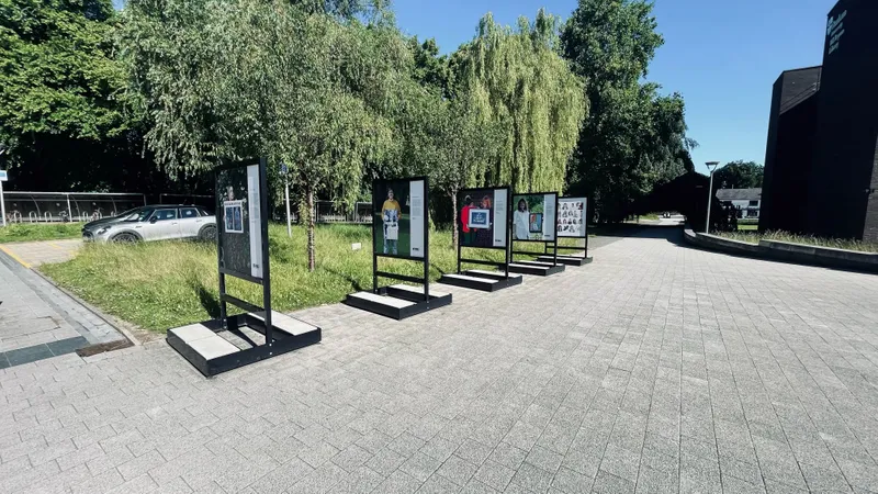 Image of outdoor gallery boards in a row