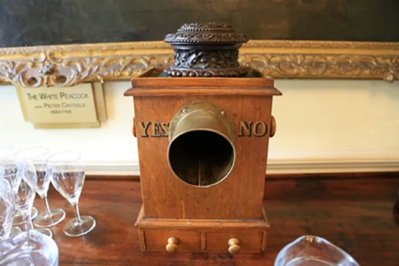 Photograph by Michelle Allen exploring the day-to-day life of Durham Castle showing the voting box in the SCR.