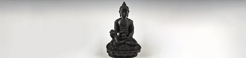 Black seated statue of Buddha