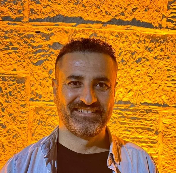 A headshot of Mohammed Lashkri