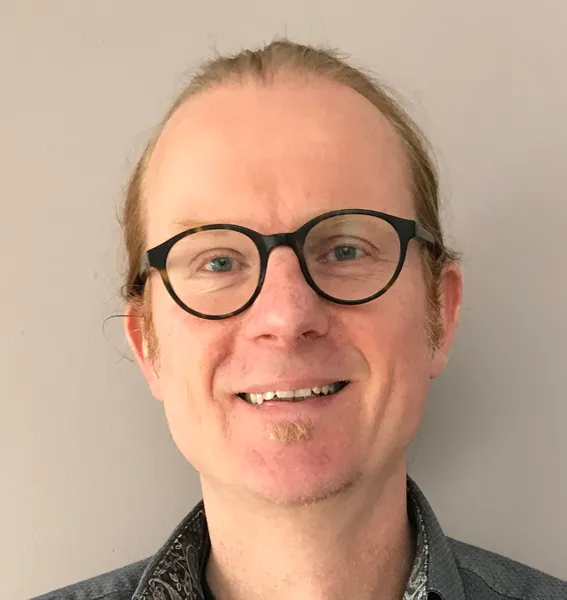 A headshot of Jeroen Van-Hunen