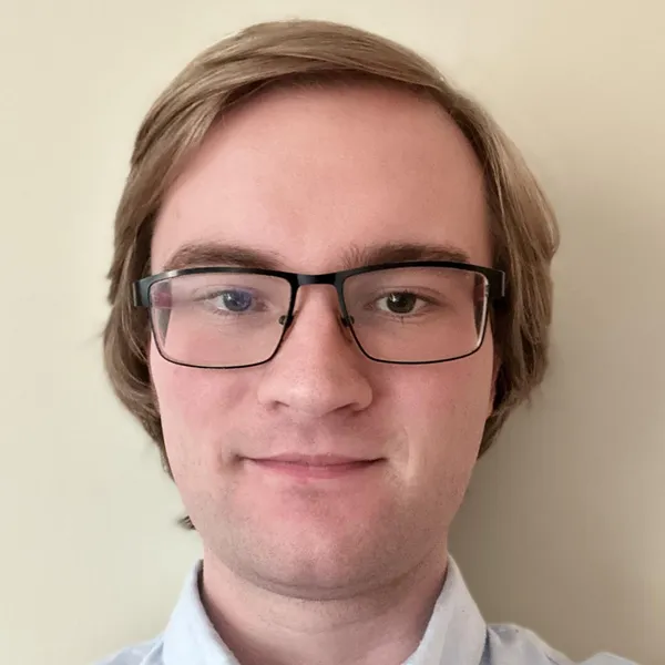 A headshot of Matthew Watson