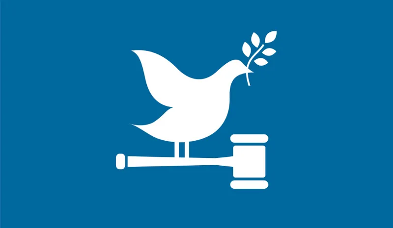 Icon showing a graphic of a dove holding a holly branch, while sat on a gavel