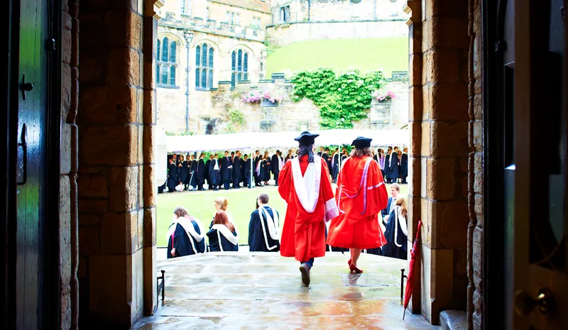 Graduating students lining up in the Castle courtyard