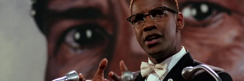 Denzel Washington starring as Malcolm X.
