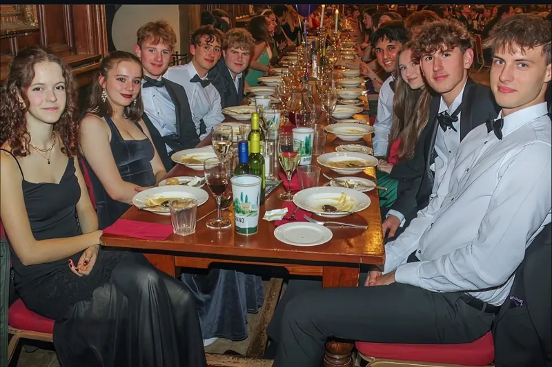 a group of students dining at a Hild Bede Formal