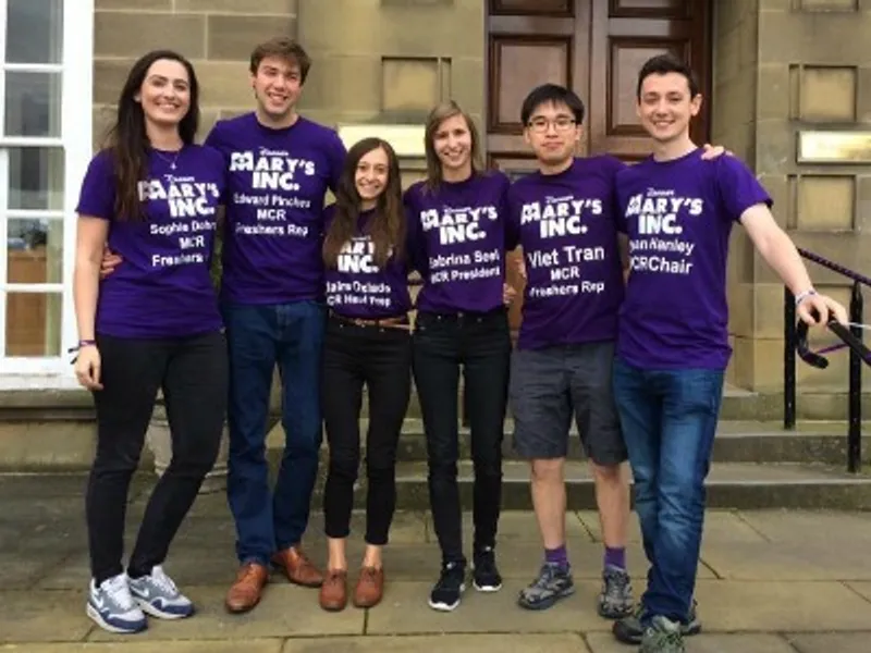 Postgraduate students standing outside St Marys College