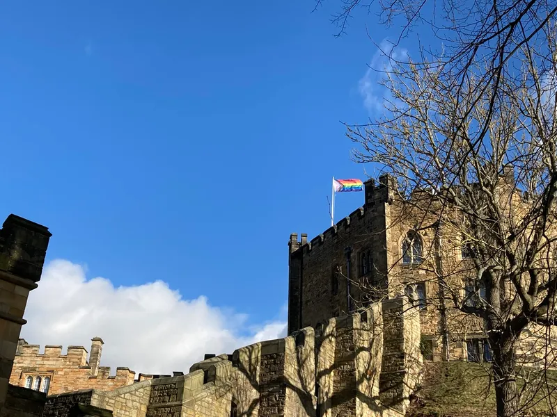 Pride flag flying over the Keep