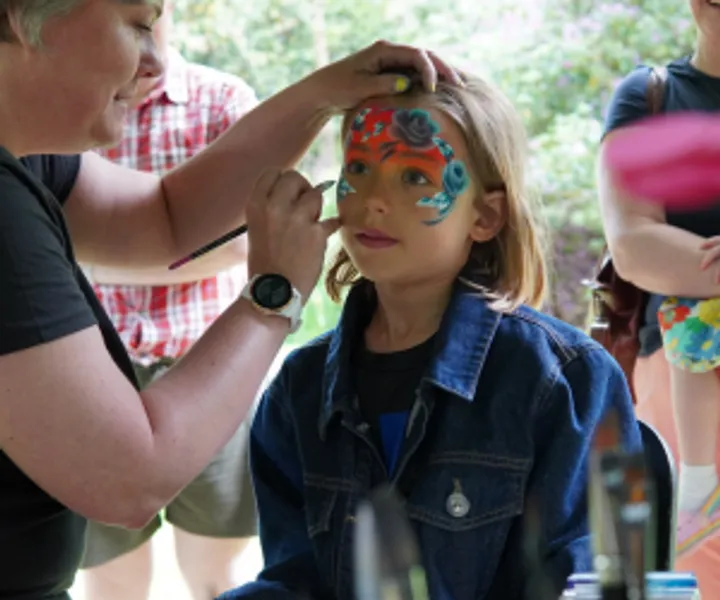Child getting face painted