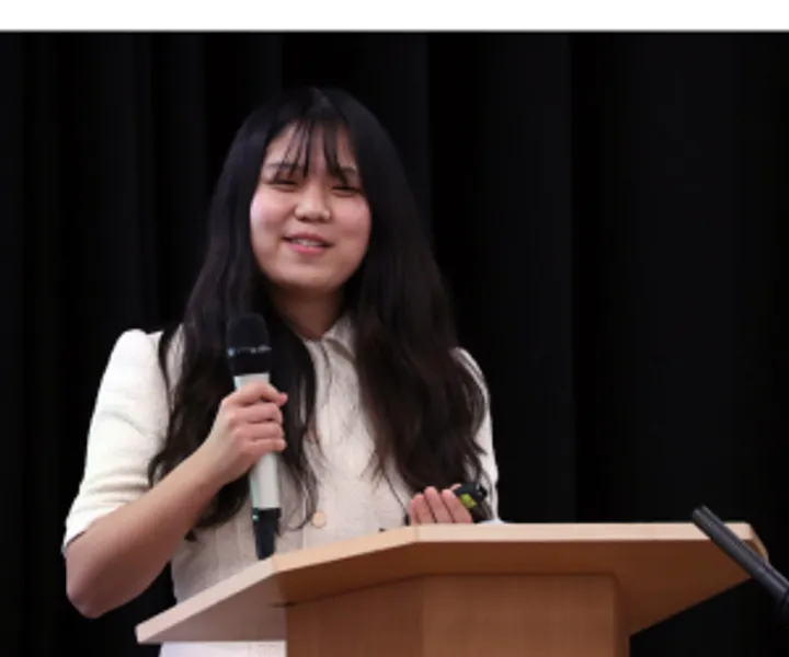 Student at lecturn