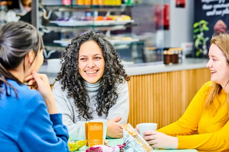 Three students in social space at Ustinov College