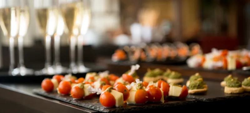 Flutes of champagne and assorted canapes