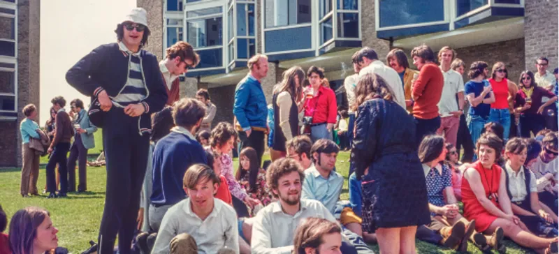 Students c1970 sitting on the lawn