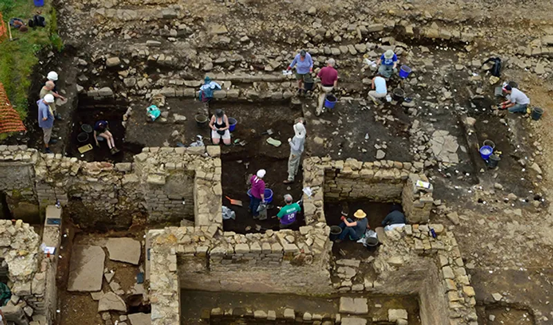 People from the local community excavating inside foundations for a roman building