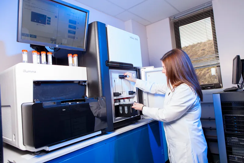 research technician using next generation sequencing instrument