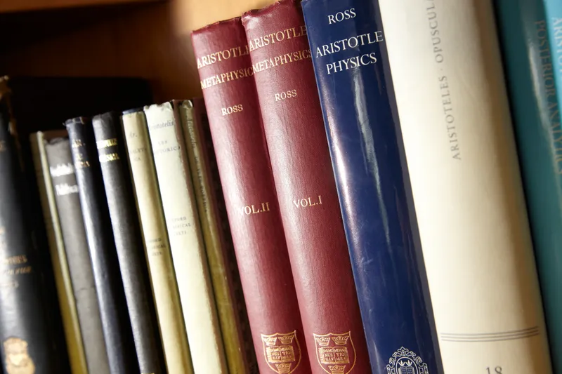 A collection of books featuring Aristotle.