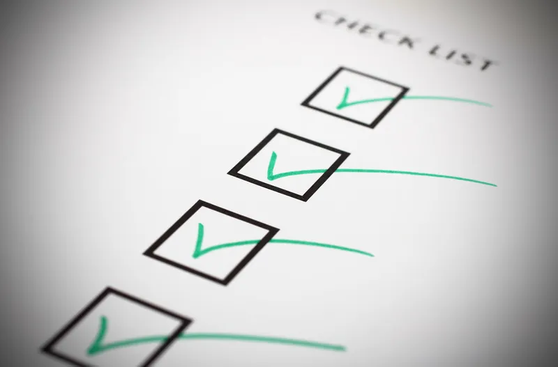 Tick boxes marked with a tick on a checklist