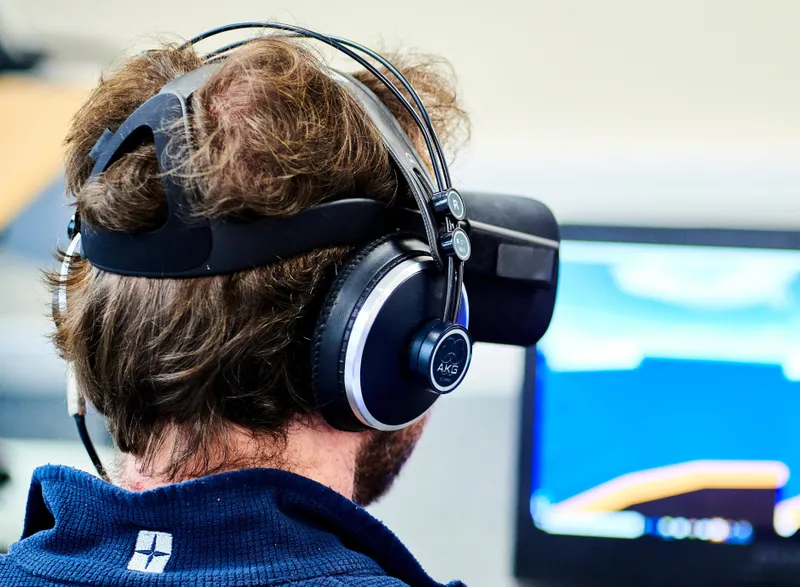 Image of a person using VR headset with screen