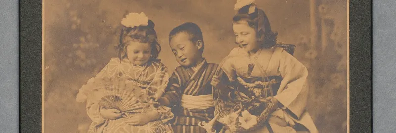 Children laughing in a sepia photo