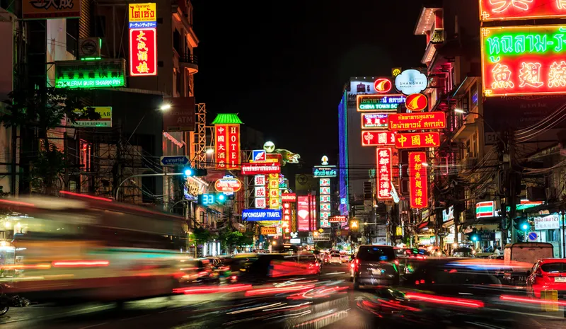 A bustling, neon-lit city in China at night