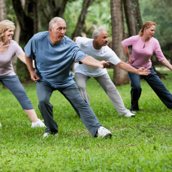 Four people practicing Tai Chi