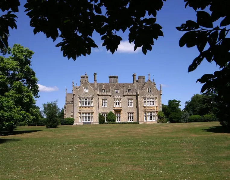 A large historic house in the sunshine