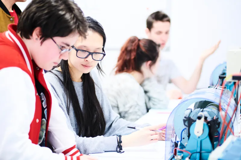 Students working in the open access space and labs in Engineering