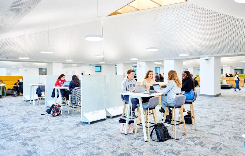 Top floor of the TLC full of students studying