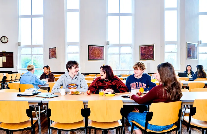 Students chatting in the Dining Hall