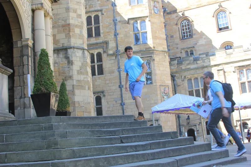 An image of the steps leading into University College with a Student Ambassador