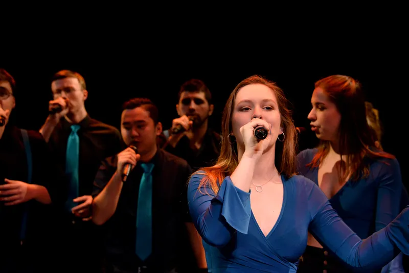 Singers performing at the Gala Theatre