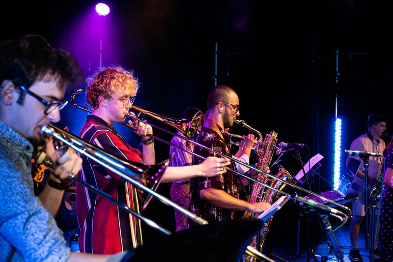 Two jazz players playing in a band