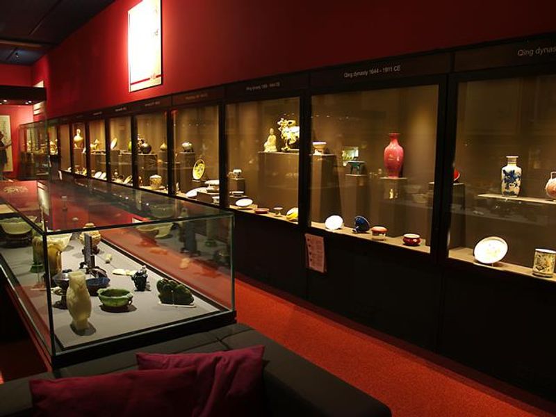 View along the displays of ceramics in the MacDonald gallery
