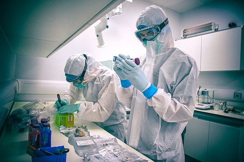 People carrying out sample preparation extraction in the Ancient DNA lab