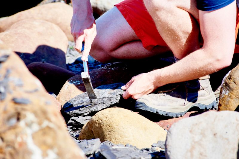 Person excavating rocks