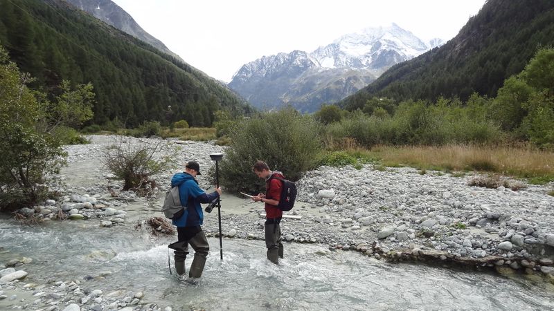 Students taking river measurements