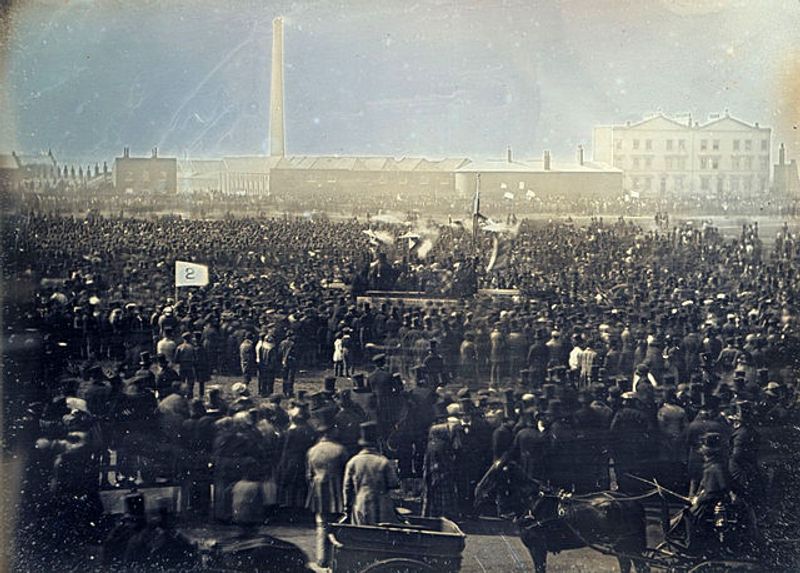 A black and white photograph of the chartist meeting at Kennington Common held in the nineteenth century showing a large number of people at a rally