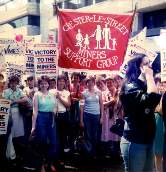 Image of a group of women with a colliery banner