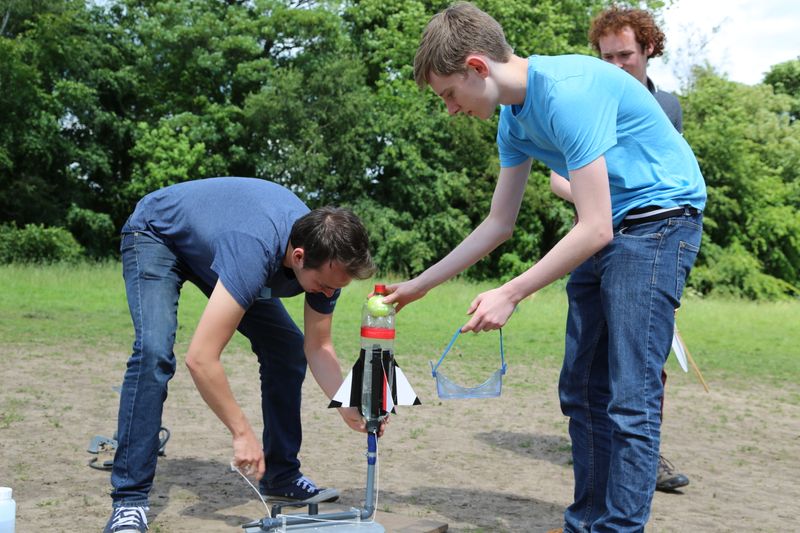Bridge project students preparing to launch a rocket
