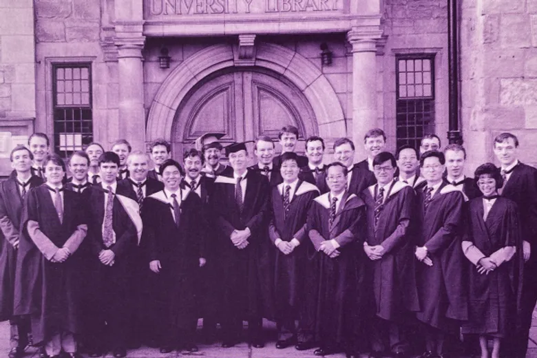 Graduation cohort outside library building